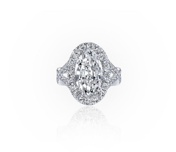 The White Oval Cut Halo Bridal Ring